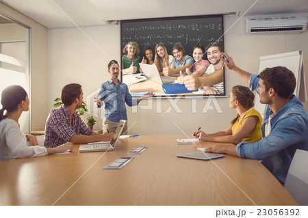 Composite image of college students gesturing thumbs up in libra 23056392