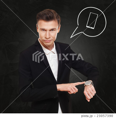 Businessman points at watch, time to call 23057390