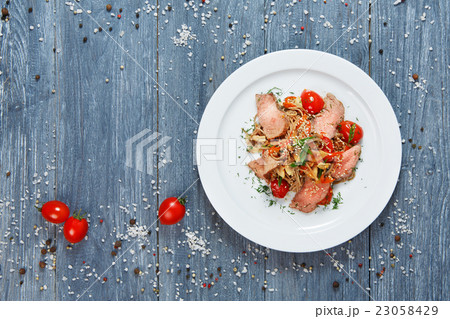 Asian food. Fried thai rice noodles with veal meat 23058429