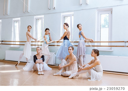 The seven ballerinas at ballet bar The seven ballerinas at ballet bar 23059270
