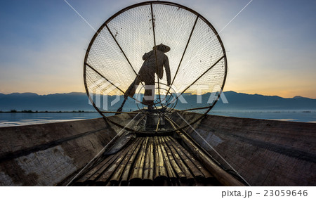 Fishermen in Inle Lake at sunrise, Myanmar 23059646