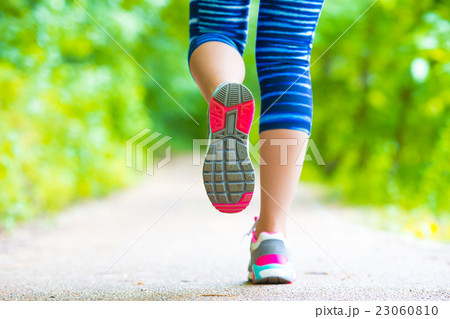 Close-up on shoe of athlete runner woman feet 23060810