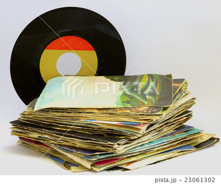 pile of 45 RPM vinyl records used and dirty even pile of 45 RPM vinyl records used and dirty even 23061302