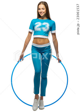 Young sporty girl with plastic hoop Young sporty girl with plastic hoop 23061537