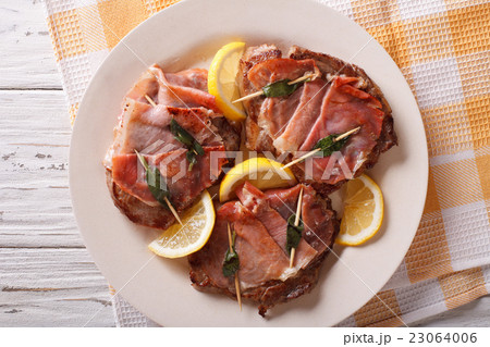 Italian beef Saltimbocca with sage, ham and lemon 23064006