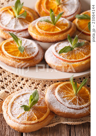 Festive cookies with oranges closeup  23064144