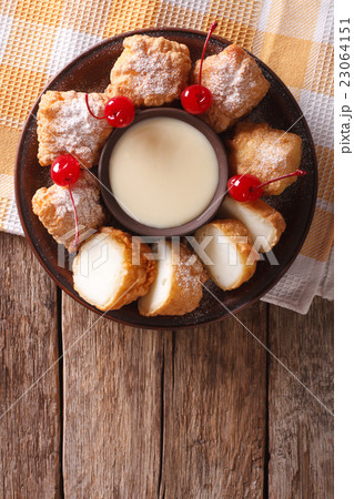 fried milk and condensed milk with cherries 23064151