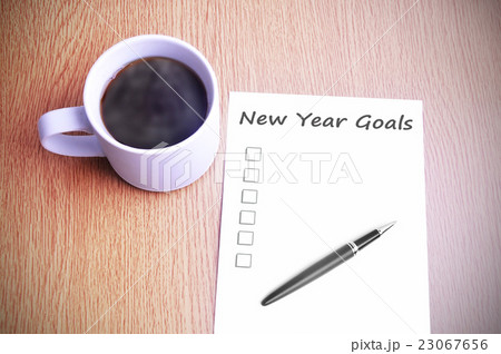 table with note writing new year goals table with note writing new year goals 23067656