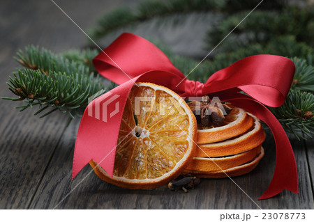 orange and anise with fir twig and ribbon bow orange and anise with fir twig and ribbon bow 23078773