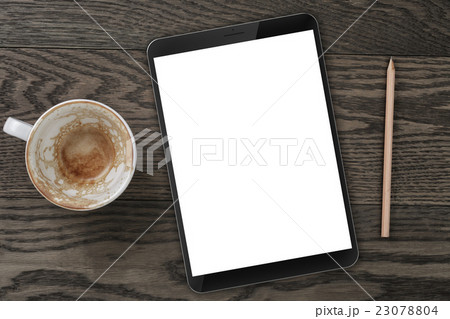 top view of table with empty coffee cup, tablet top view of table with empty coffee cup, tablet 23078804