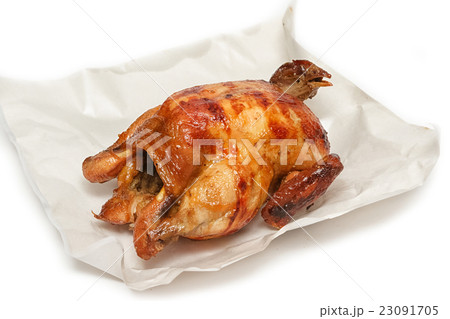 Roasted chicken on white paper Roasted chicken on white paper 23091705