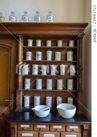 Empty bottles in old vintage pharmacy 23093721