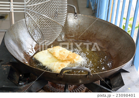 Frying Cooking Mughlai paratha Frying Cooking Mughlai paratha 23098401