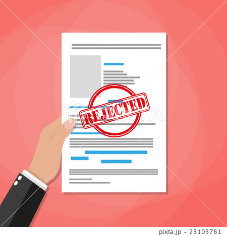 Hand holds rejected paper document 23103761