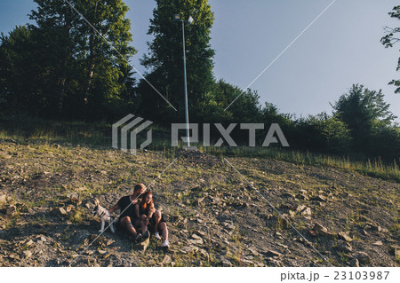 Photo of a couple in the mountains Photo of a couple in the mountains 23103987