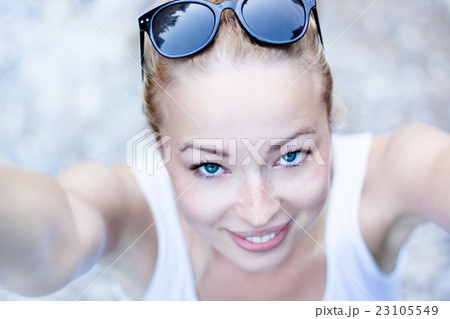 Selfie of a cheerful young woman. Selfie of a cheerful young woman. 23105549