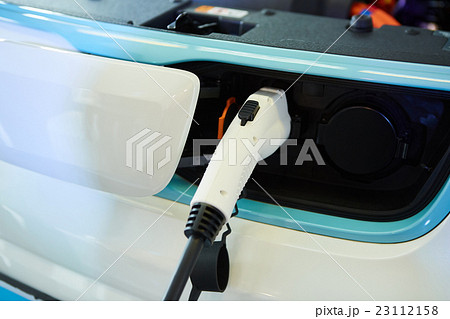 Charging an electric car Charging an electric car 23112158