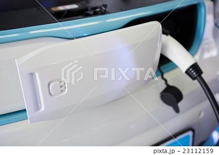 Charging an electric car Charging an electric car 23112159