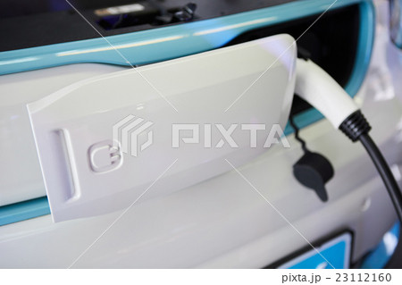 Charging an electric car Charging an electric car 23112160