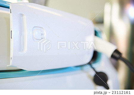 Charging an electric car Charging an electric car 23112161