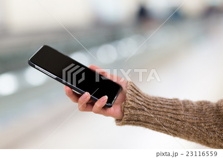 Woman use of cellphone Woman use of cellphone 23116559