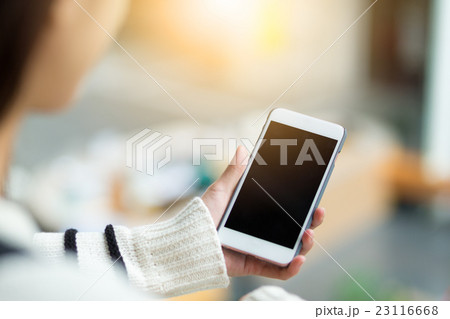 Woman hold with cellphone Woman hold with cellphone 23116668