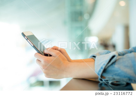 Woman use of cellphone Woman use of cellphone 23116772