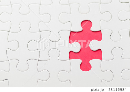 Jigsaw puzzle on red background Jigsaw puzzle on red background 23116984