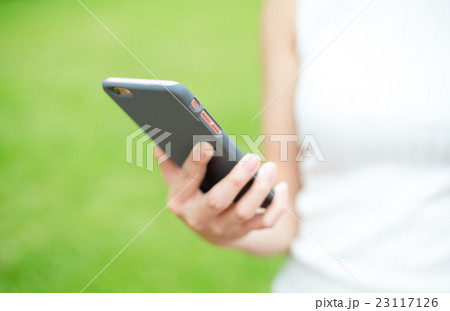 Woman use of cellphone Woman use of cellphone 23117126
