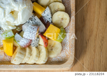 Pancake and fruit with ice cream on table . Pancake and fruit with ice cream on table . 23118204