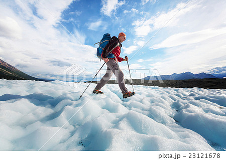 Hiker on glacier Hiker on glacier 23121678
