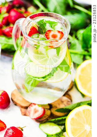 Water with lemon, mint and cucumber in glass 23126853