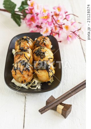 Close up of takoyaki on wooden table Close up of takoyaki on wooden table 23128074