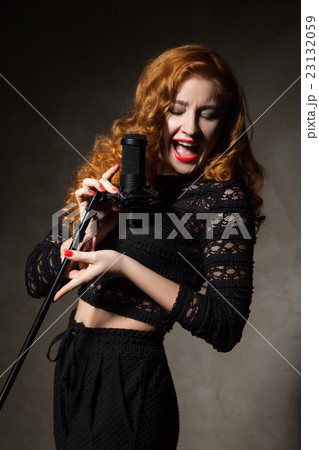 Red-haired diva singing song 23132059