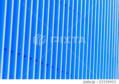 Detail of blue striped metal facade for background 23150413