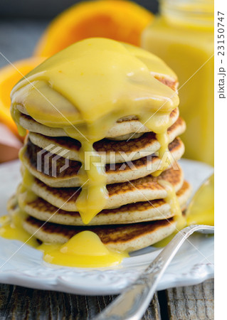Pancakes wholegrain cereal with orange custard. 23150747
