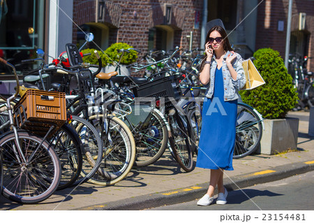 Young caucasian woman talking by cell phone in 23154481