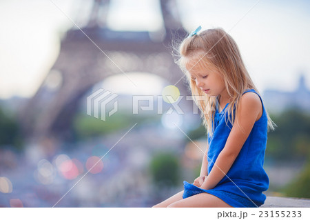 Adorable little girl in Paris background the Adorable little girl in Paris background the 23155233