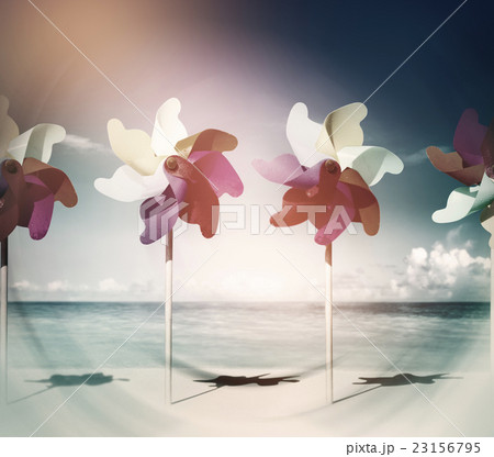 Pinwheels On The Beach Blowing Sunshine Concept Pinwheels On The Beach Blowing Sunshine Concept 23156795