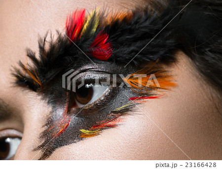 Beautiful girl in image of Phoenix bird with 23166428