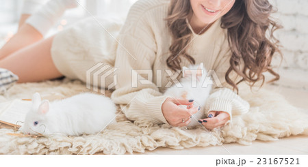 women with rabbit 23167521