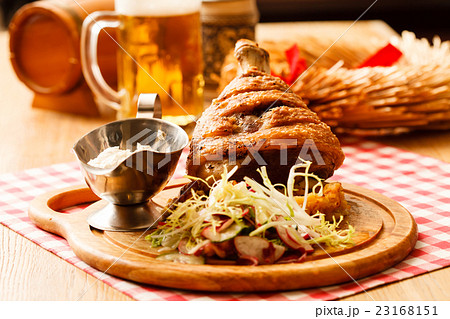 eisbein with braised cabbage, salad and beer eisbein with braised cabbage, salad and beer 23168151