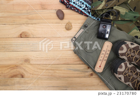 Travel accessories set on wooden Travel accessories set on wooden 23170780