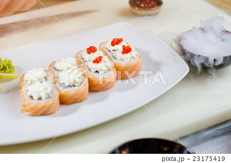 Sushi with caviar on plate. Sushi with caviar on plate. 23175419