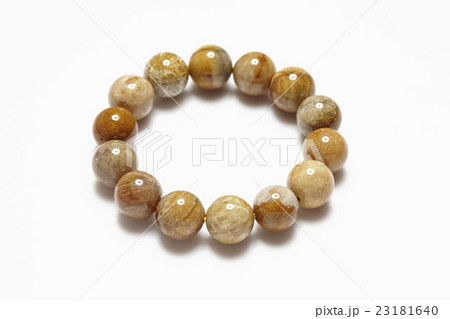 Lucky stone bracelet on white background. Lucky stone bracelet on white background. 23181640