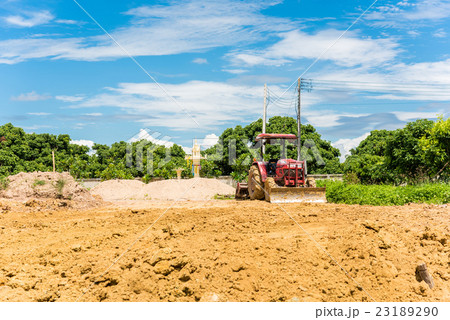 Tractor working in construction site 23189290