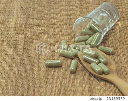 herb in capsule pill herb in capsule pill 23189579