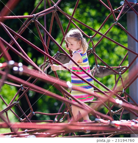 Child having fun on school yard playground 23194760