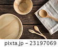 Empty round wooden plate on wood table background 23197069