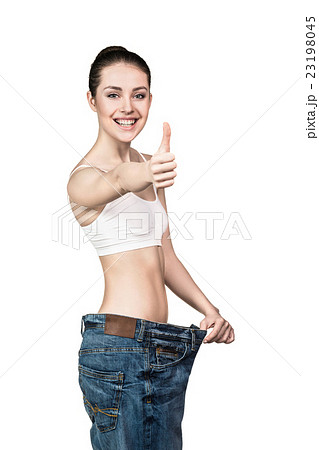 Slimming woman wearing big pants. Slimming woman wearing big pants. 23198045